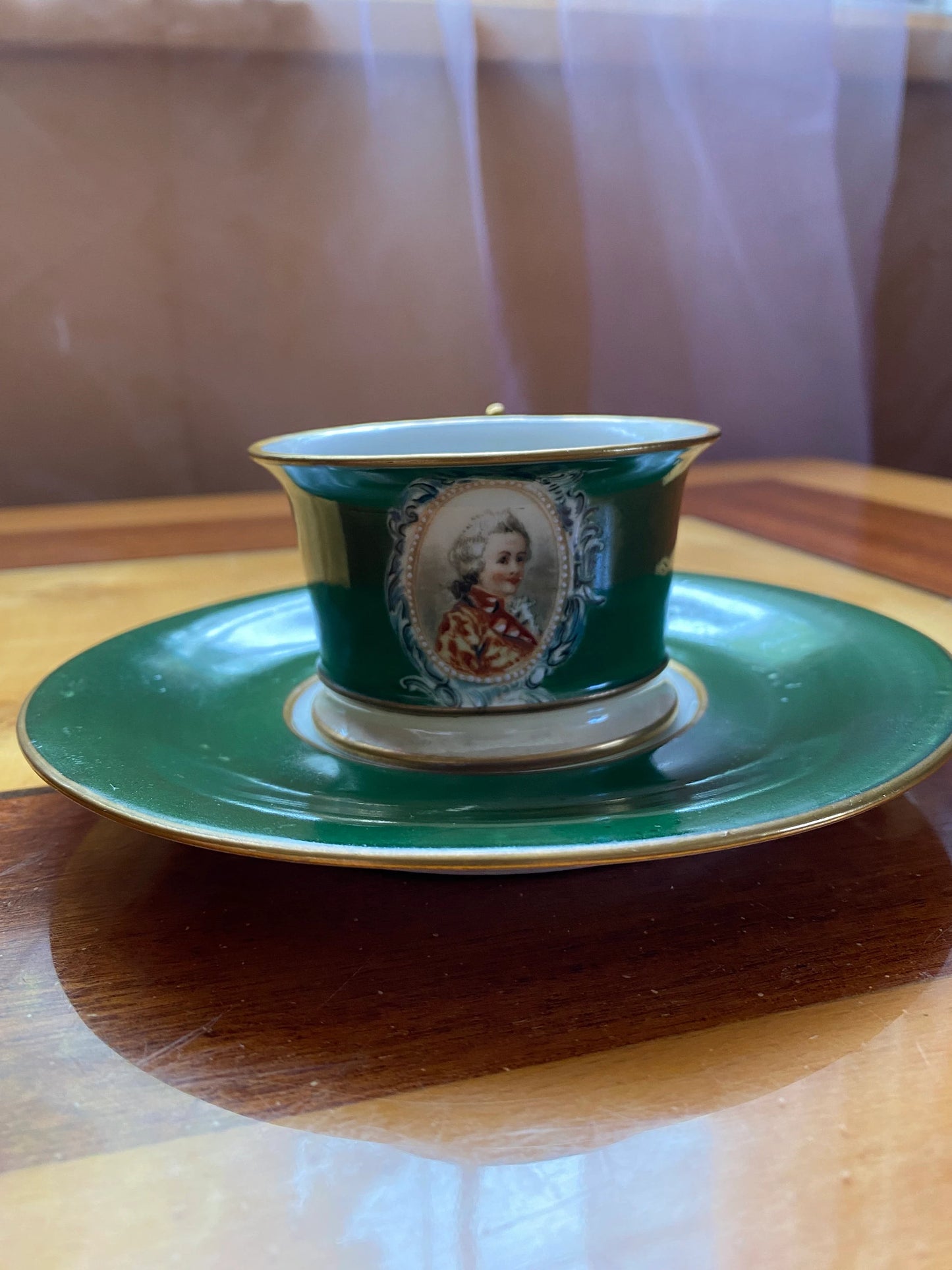 Antique Limoges Porcelain Cup & Saucer – Green Glaze with Portrait – ca. 20th century