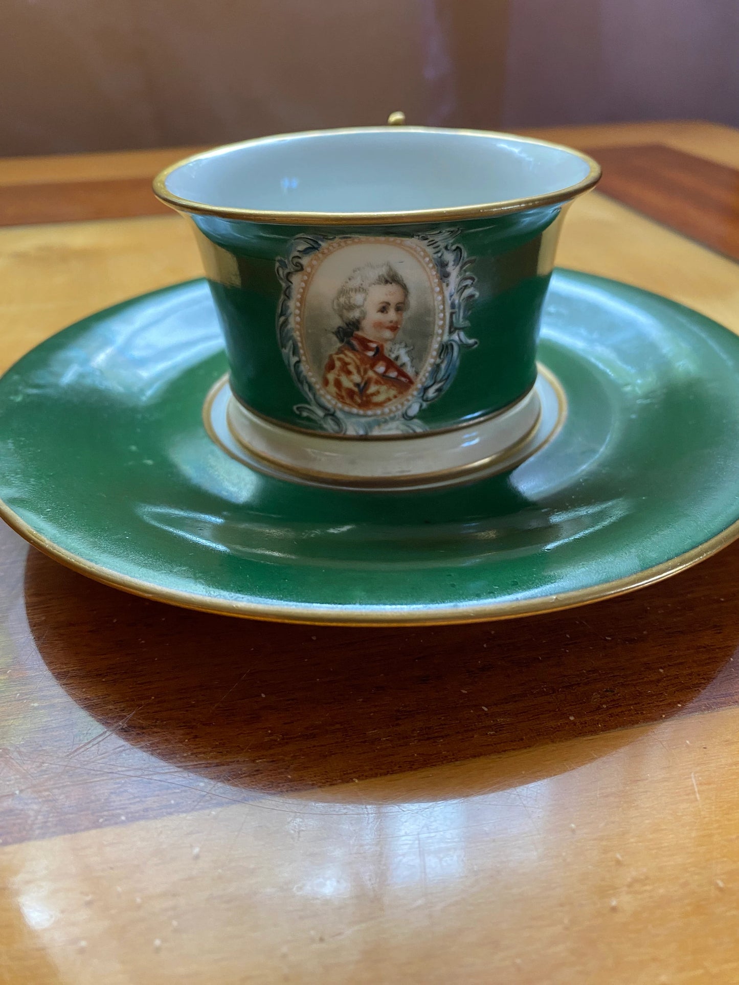 Antique Limoges Porcelain Cup & Saucer – Green Glaze with Portrait – ca. 20th century