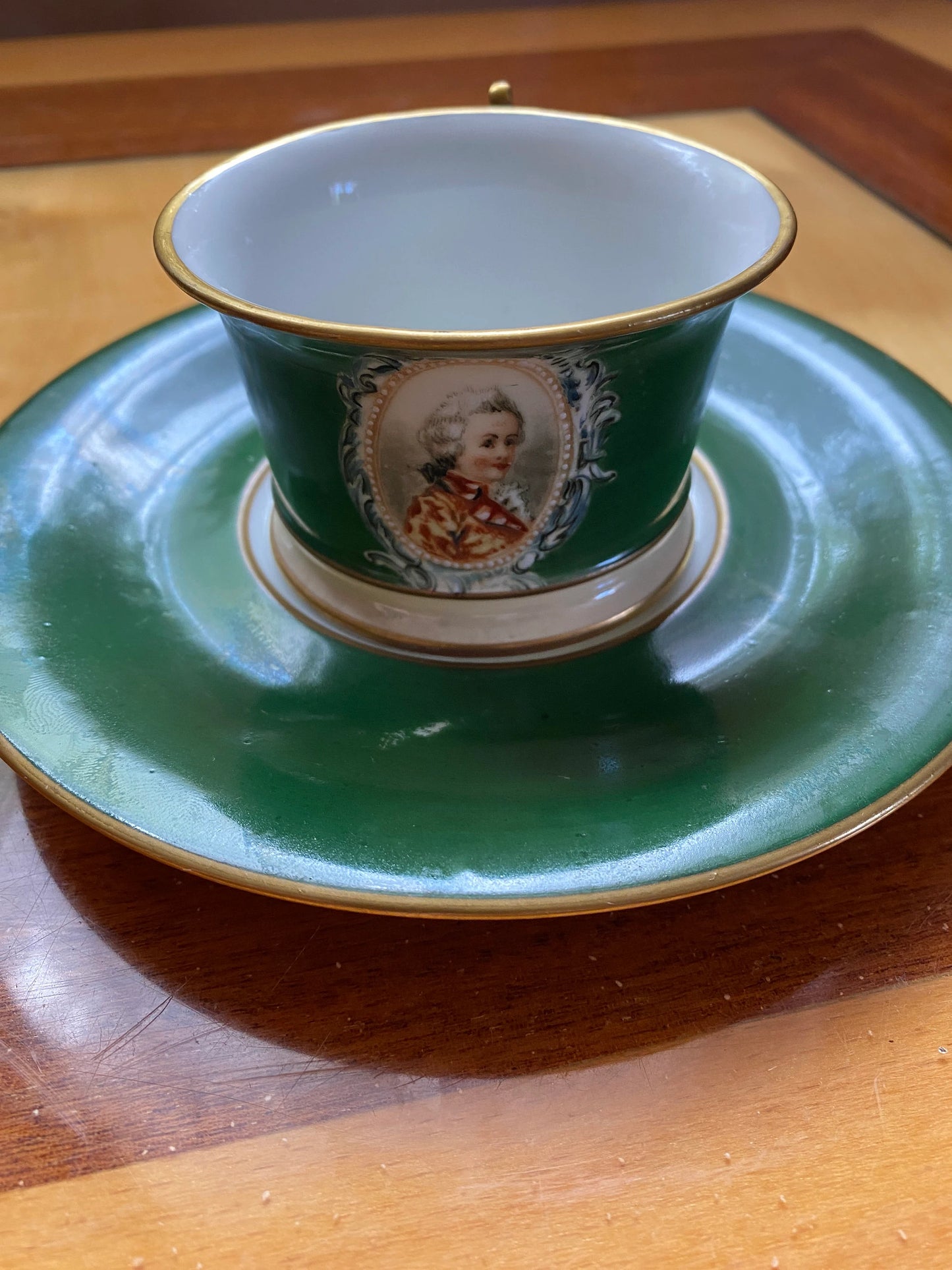 Antique Limoges Porcelain Cup & Saucer – Green Glaze with Portrait – ca. 20th century