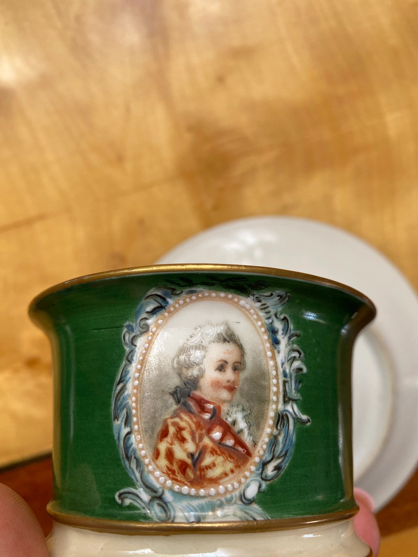 Antique Limoges Porcelain Cup & Saucer – Green Glaze with Portrait – ca. 20th century