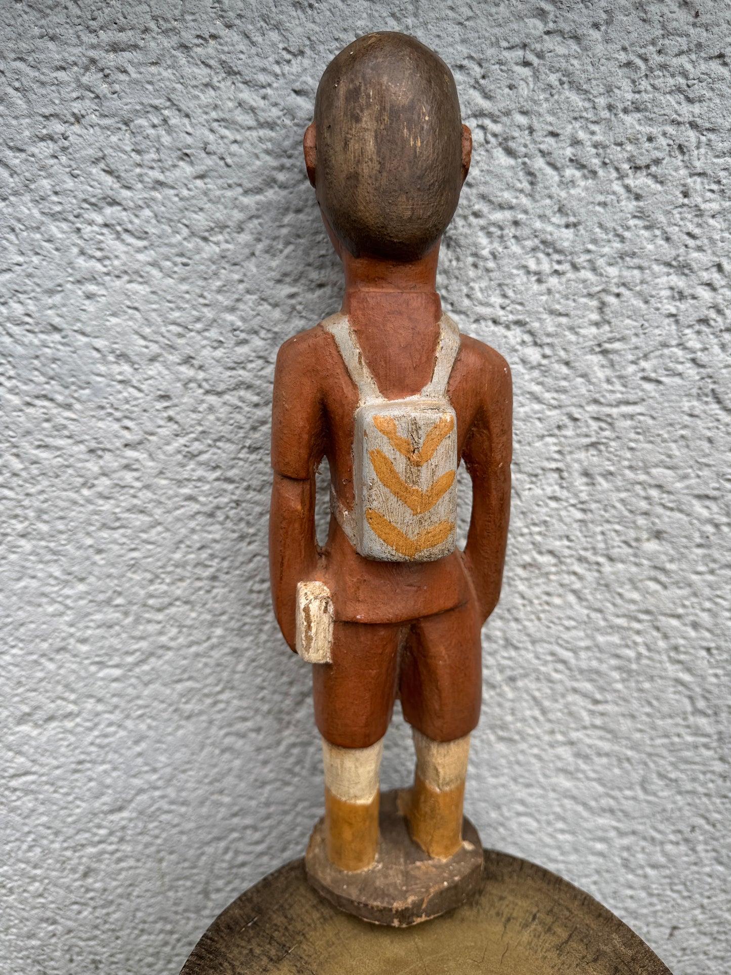 Hand-Carved Wooden Figurine – Boy with Book and Backpack