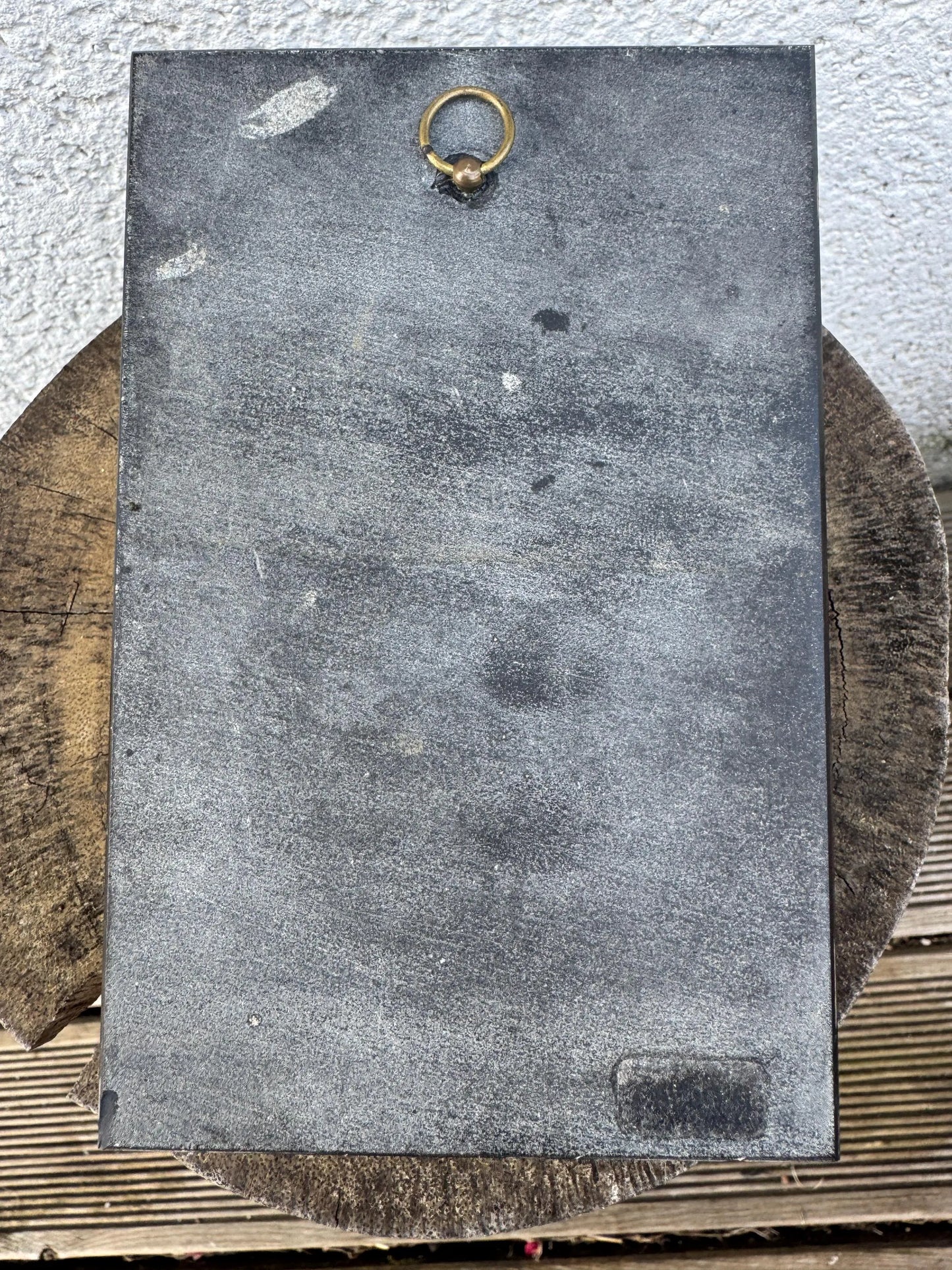 White Marble Relief of Madonna and Child on Black Slab